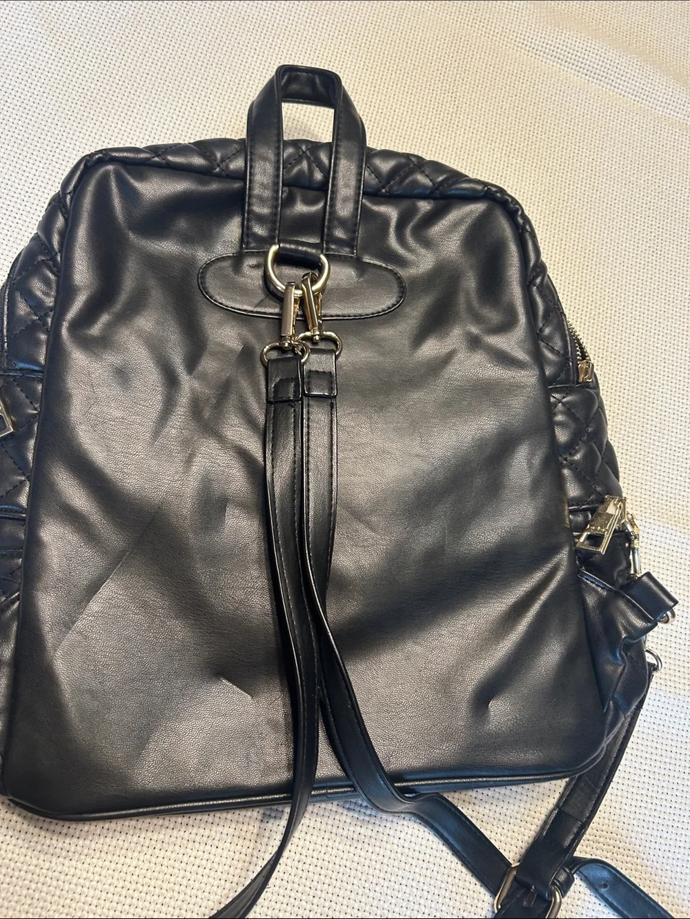 bebe Black Quilted Leather Backpack with Gold Plate